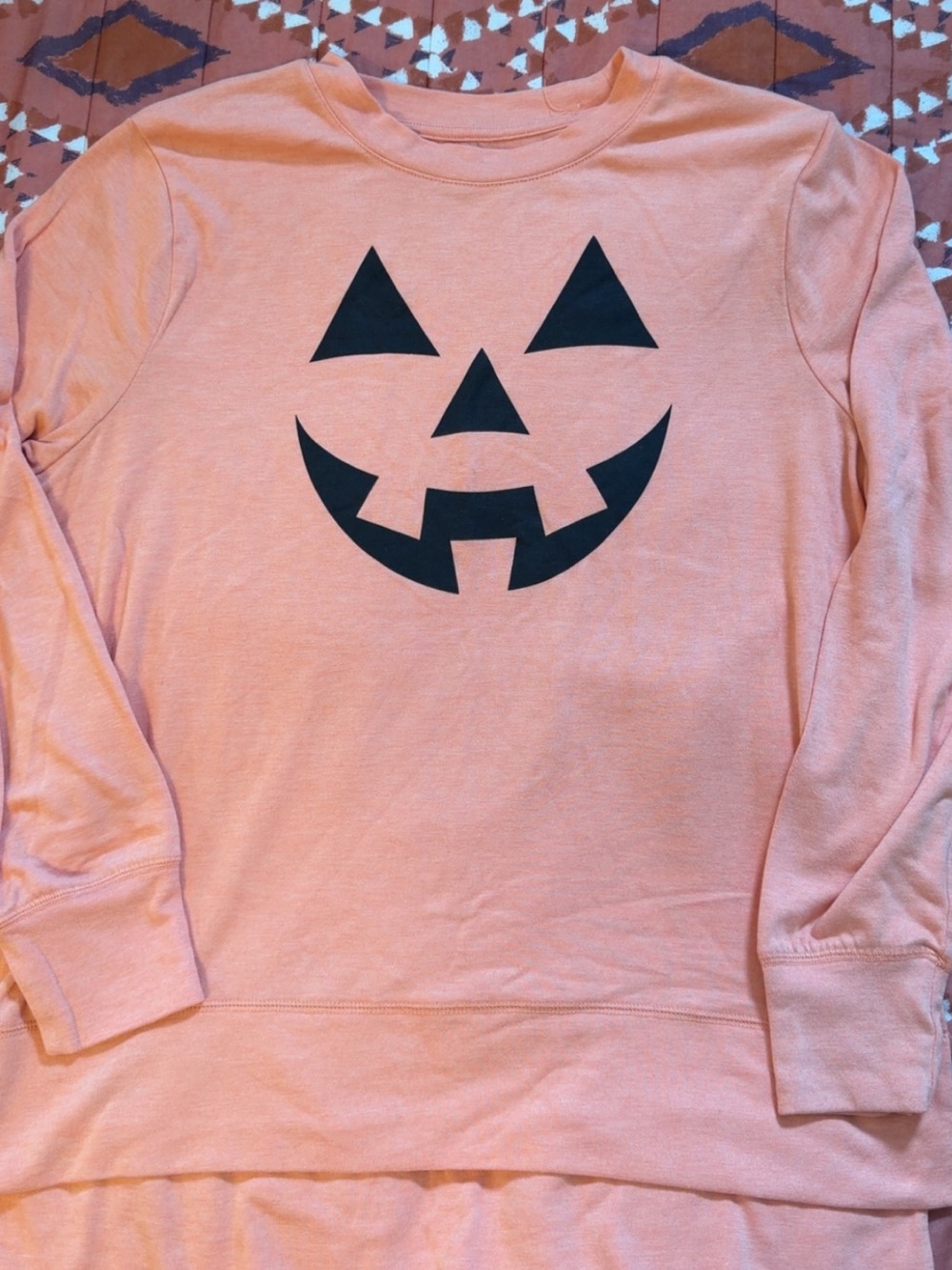 Women’s Peach Pumpkin Face Crewneck Sweatshirt
